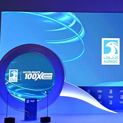 adnoc-accelerate-100x-forum-stage-led-backdrop-uae.webp