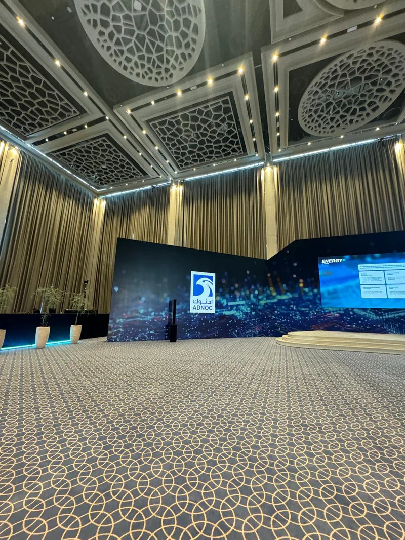 adnoc-energy-ai-branded-stage-scenic-walls-abu-dhabi-2024