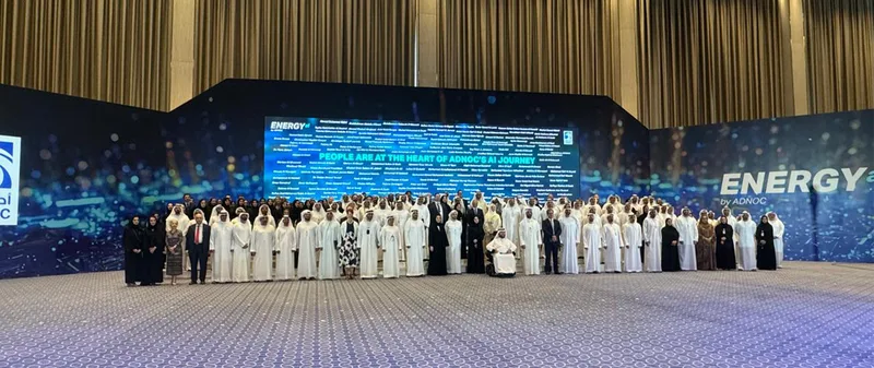adnoc-energy-ai-corporate-group-photo-stage-abu-dhabi-2024
