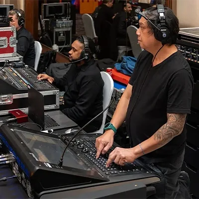 audio-engineers-mixing-console-live-event-uae