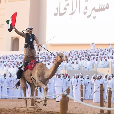 camel-rider-uae-flag-national-day-parade-uae