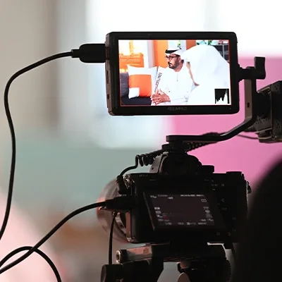 camera-monitor-live-interview-government-event-uae