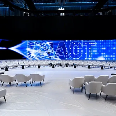 corporate-conference-circular-seating-led-screen-enact-dubai-uae-audio-visual.webp