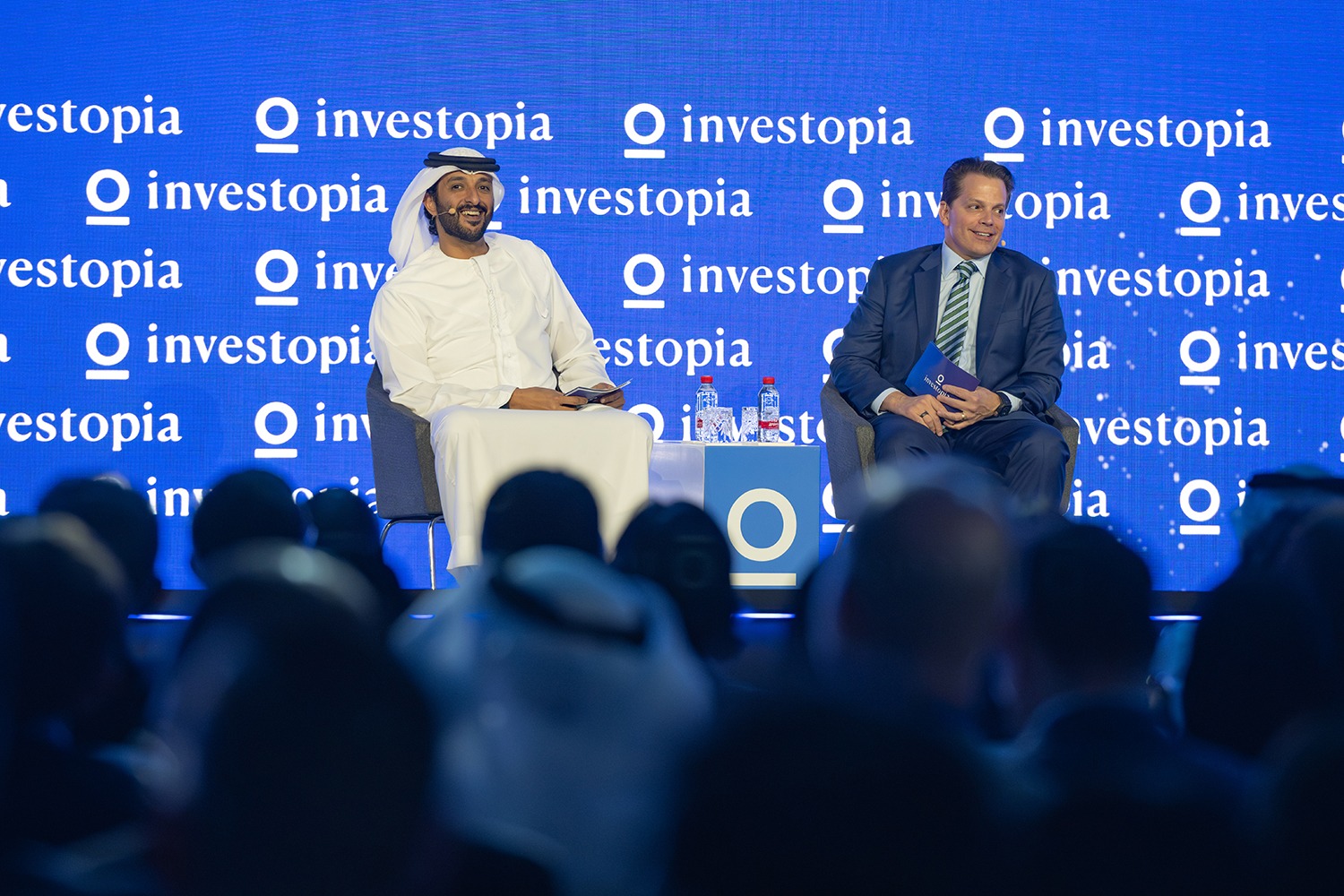 investopia-2024-panel-discussion-led-backdrop-abu-dhabi