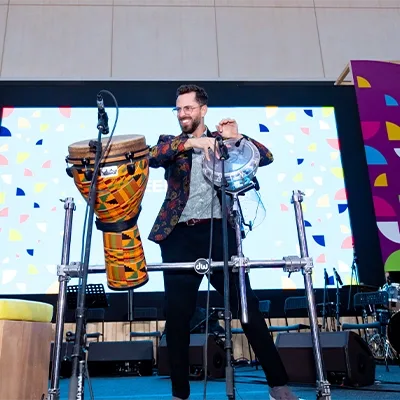 live-percussionist-djembe-drums-stage-performance-dubai-uae-audio-production.webp