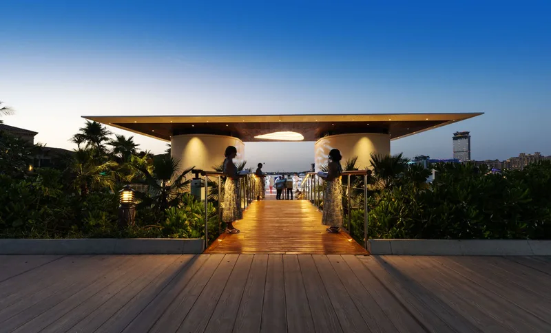 looking-glass-safina-sunset-entrance-walkway-2024