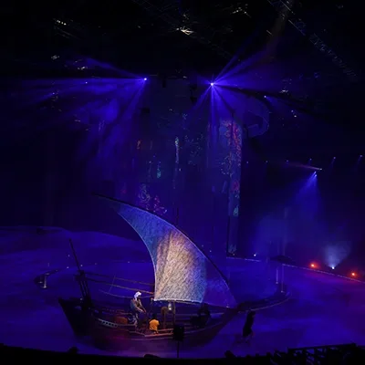 theatrical-stage-boat-set-blue-lighting-production-uae.webp