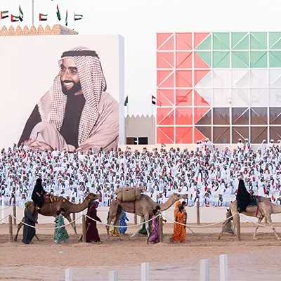 uae-national-day-crowd-camel-parade-portrait-uae