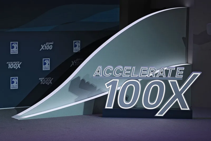 adnoc-accelerate-100x-illuminated-logo-feature-abu-dhabi-2022